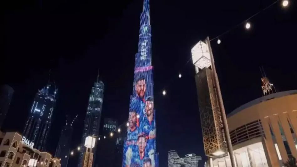T20 World Cup: Burj Khalifa-য় টিম ইন্ডিয়ার নতুন জার্সির ঝলক...ভিডিও Viral T20 World Cup: Burj Khalifa-য় টিম ইন্ডিয়ার নতুন জার্সির ঝলক...ভিডিও Viral