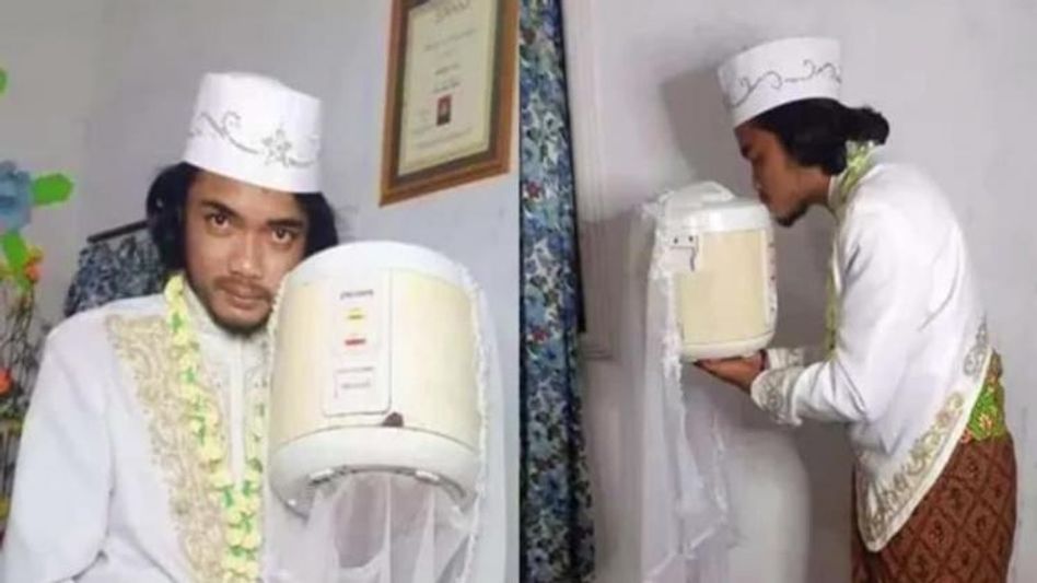 Viral : নিরপেক্ষ, বাধ্য এবং রন্ধন পটিয়সী স্ত্রী খুঁজতে 'রাইস কুকার'কে বিয়ে যুবকের  Viral : নিরপেক্ষ, বাধ্য এবং রন্ধন পটিয়সী স্ত্রী খুঁজতে 'রাইস কুকার'কে বিয়ে যুবকের