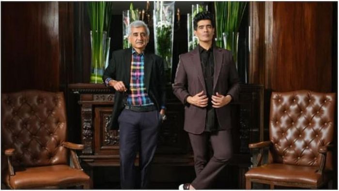 ডিজাইনার মনীশ মালহোত্রা (ডান দিকে) ও রিলায়েন্স ব্র্যান্ডস লিমিটেডের এমডিও সিইও দর্শন মেহতা