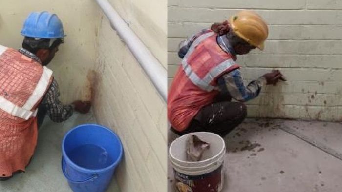 গুটখার পিকের দাগ পরিস্কার করছেন এক কর্মী। সংগৃহীত ছবি