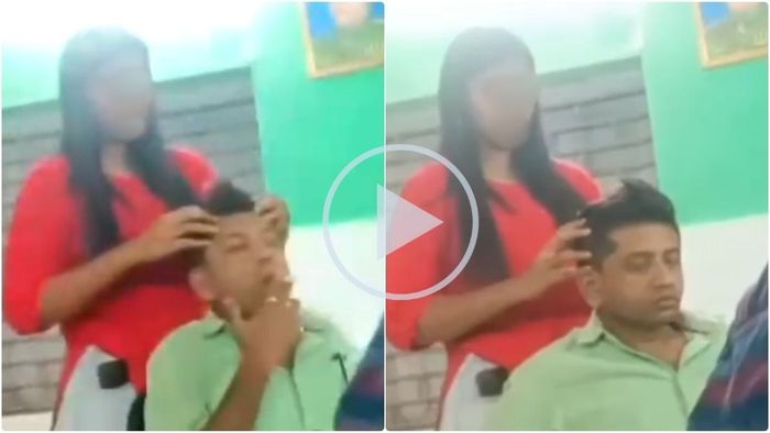 মাথা টিপছেন ছাত্রী।-ফাইল ছবি