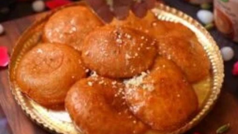পুজোর মিষ্টিমুখে এবার ঘরেই বানান ঠাকুরবাড়ির দইয়ের মালপোয়া