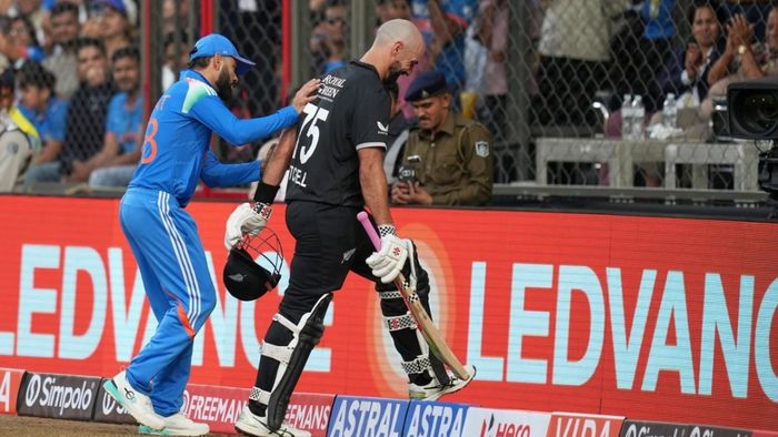 বিরাট কোহলি এবং ড্যারিল মিচেল