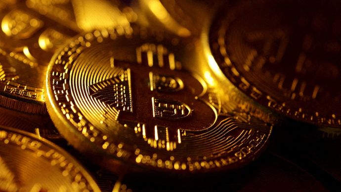 FILE PHOTO: Physical representations of the bitcoin cryptocurrency are seen in this illustration taken October 24, 2023. REUTERS/Dado Ruvic/Illustration/File Photo bitcoin