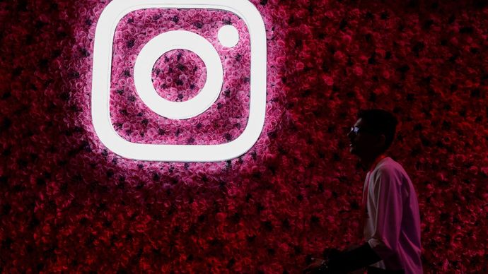 A man walks past a logo of mobile application Instagram, during a conference in Mumbai, India, September 20, 2023. REUTERS/Francis Mascarenhas/ File Photo Instagram logo