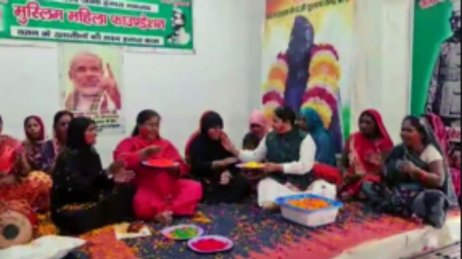 Muslim women playing holi Muslim women playing holi