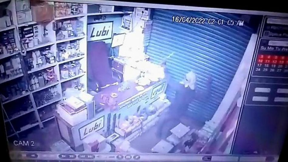 Theif dances in front of CCTV camera Theif dances in front of CCTV camera