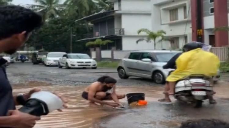 Protest against potholes on road