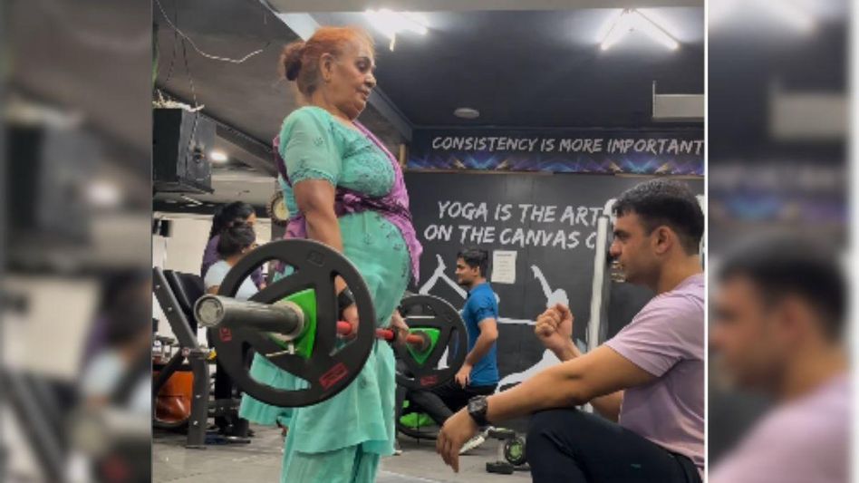 68-Year-Old Woman Weight Lifts With Trainer Son At Gym 68-Year-Old Woman Weight Lifts With Trainer Son At Gym