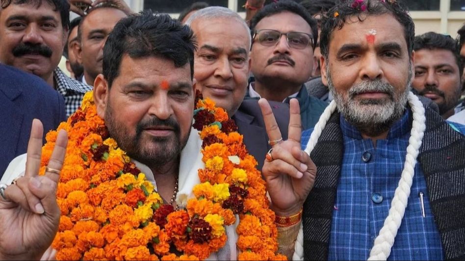 Brijbhushan Sharan Singh and Sanjay Singh (file photo) Brijbhushan Sharan Singh and Sanjay Singh (file photo)