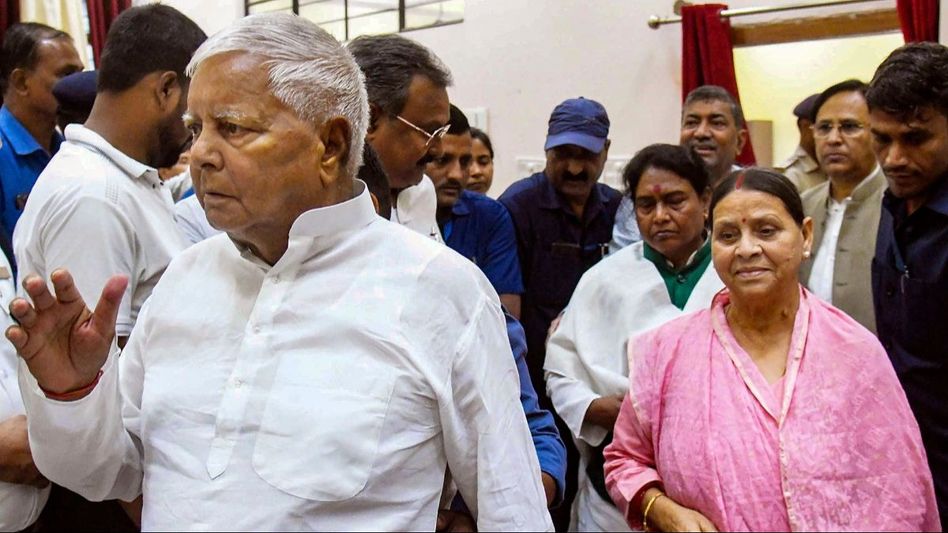 RJD Chief Lalu Prasad with Rabri Devi RJD Chief Lalu Prasad with Rabri Devi