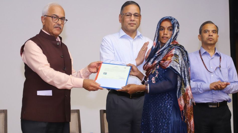 Union Home Secretary Ajay Kumar Bhalla handing over citizenship certificate under CAA.  Union Home Secretary Ajay Kumar Bhalla handing over citizenship certificate under CAA.