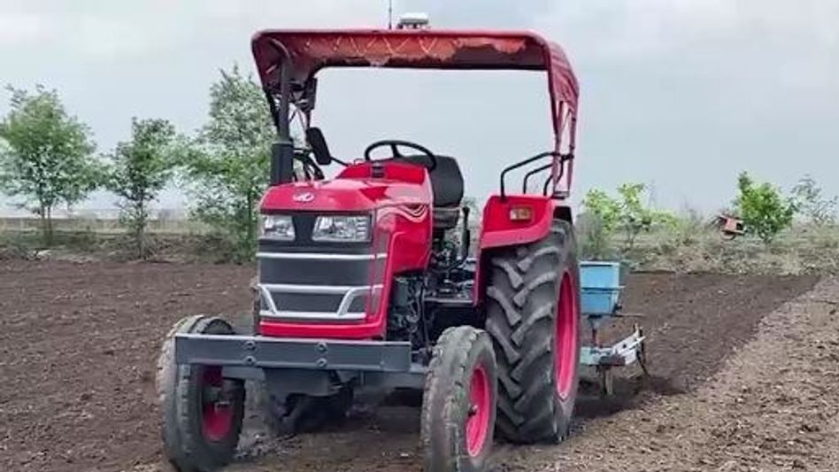 Sowing is being done using unmanned tractor Sowing is being done using unmanned tractor
