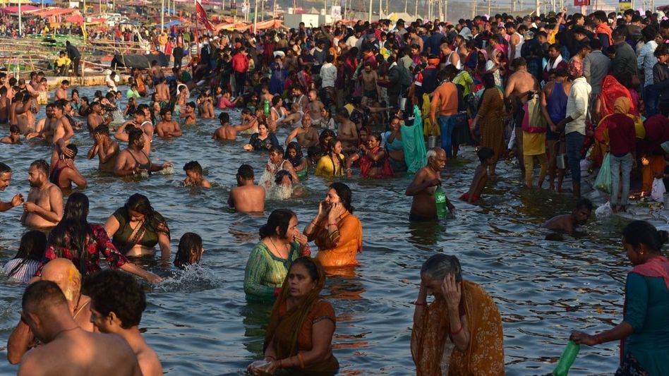 Devotees take a holy dip in the River Ganga Devotees take a holy dip in the River Ganga