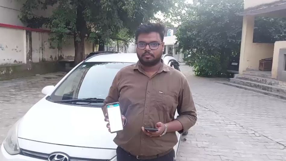 Tushar Saxena Rampur received challan for not wearing a helmet inside his car Tushar Saxena Rampur received challan for not wearing a helmet inside his car
