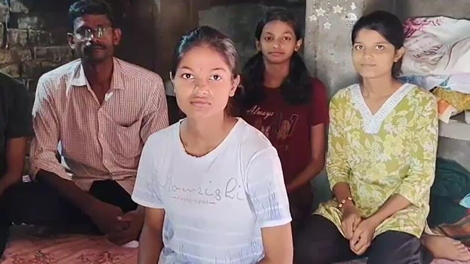 one man and three girl sitting on bed one man and three girl sitting on bed