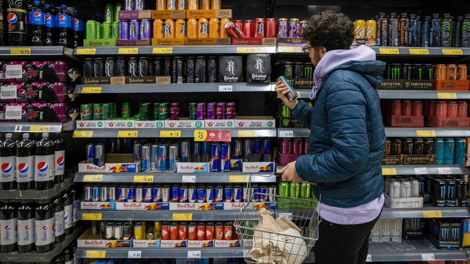 Man shopping in a supermarket Man shopping in a supermarket