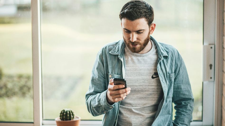 Man Using Phone/Unsplash Man Using Phone/Unsplash