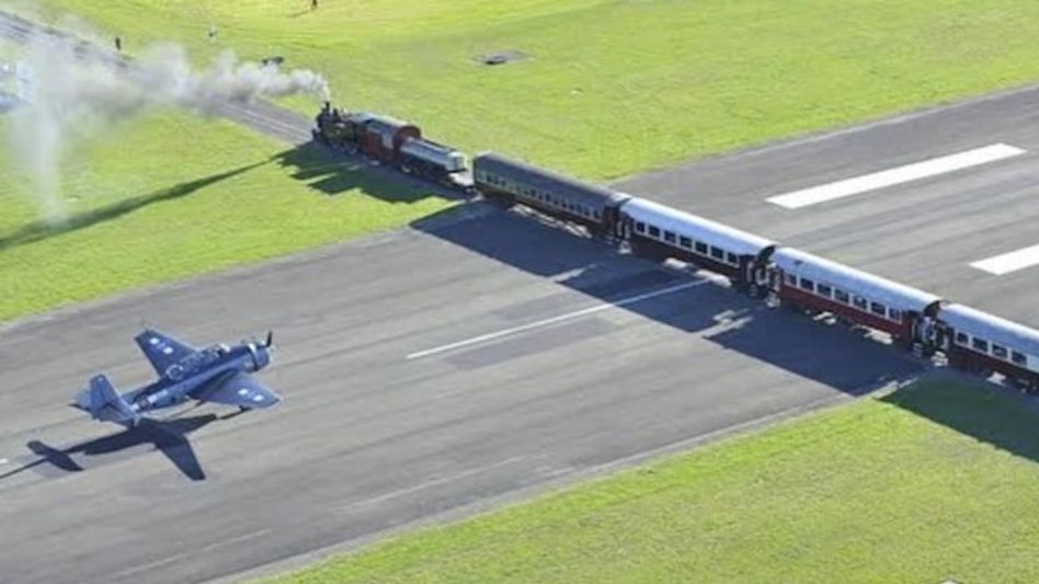 Airport with train crossing runway Airport with train crossing runway