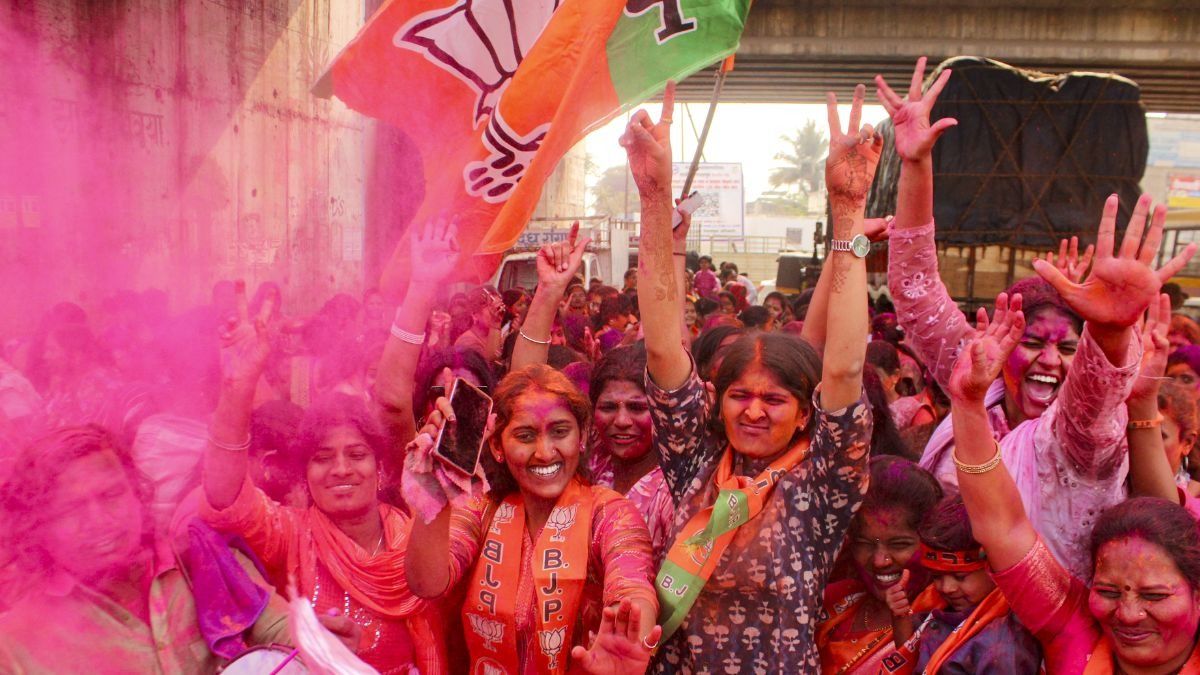 BJP workers celebrate as the party leads (Photo/PTI)