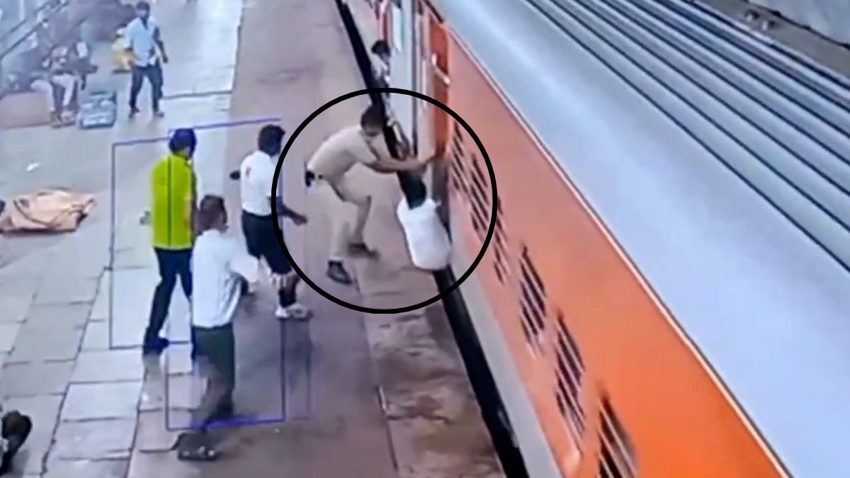 चलती ट्रेन से उतरने के चक्कर में मौत के मुंह में फंस गया युवक, RPF जवान ने दिखाई फुर्ती, बचा ली जान, Video Viral