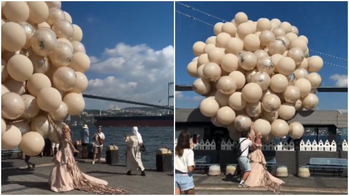 Bride's giant balloon bouquet nearly sends her flying during windy day photoshoot