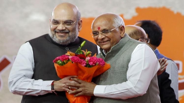 गृहमंत्री अमित शाह के साथ गुजरात के नए सीएम भूपेंद्र पटेल. (फोटो-PTI)