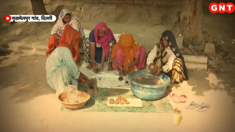 Womens preparing diya from Cow dung