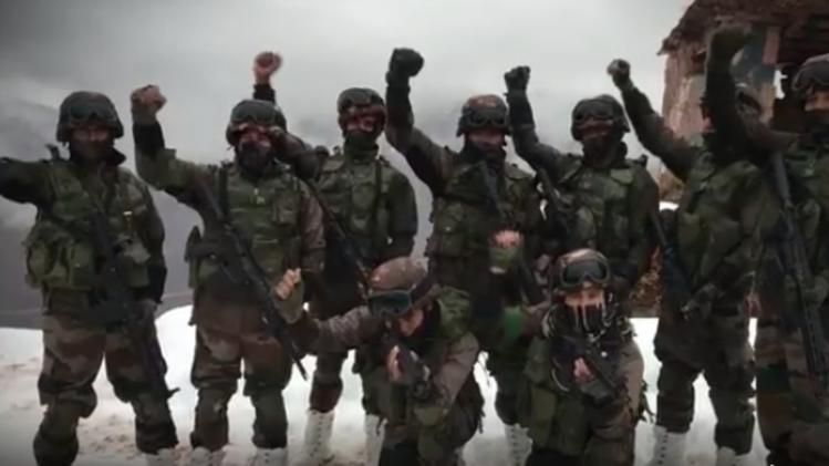 army personnel patrolling heavy snowfall