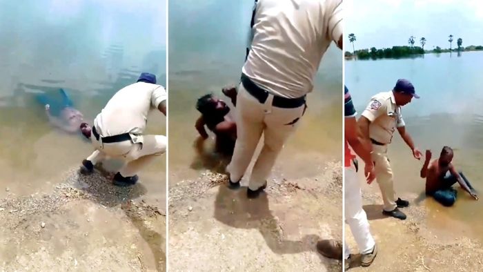 પોલીસવાળાએ પાણીમાં પડેલા માણસને બહાર કાઢ્યો અને તે ઊભો થઈ ગયો.