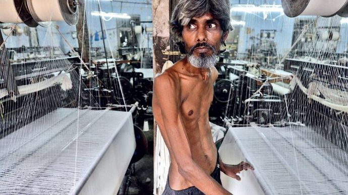 मदद की दरकारः मुंबई के पास भिवंडी के पॉवरलूम में बुनकर की दशा