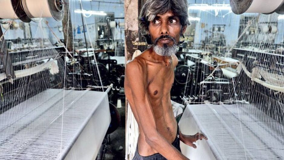 मदद की दरकारः मुंबई के पास भिवंडी के पॉवरलूम में बुनकर की दशा