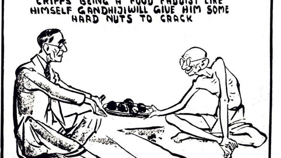 1946 में दिल्ली में क्रिप्स को मेवा खिलाते गांधी जी-इस कार्टून में भारत की आजादी पर बातचीत के दौरान ग