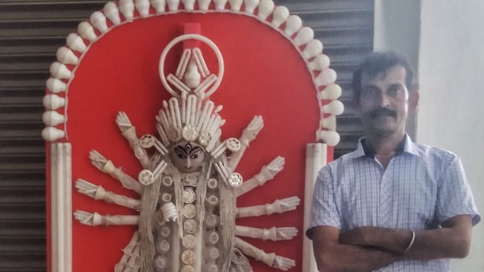 Assam: Veteran artist designs Durga idol out of bulbs and lights Assam: Veteran artist designs Durga idol out of bulbs and lights
