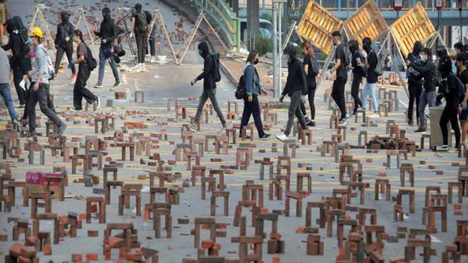 70-Year-Old Dies After Being Hit with Brick by Hong Kong Protesters 70-Year-Old Dies After Being Hit with Brick by Hong Kong Protesters
