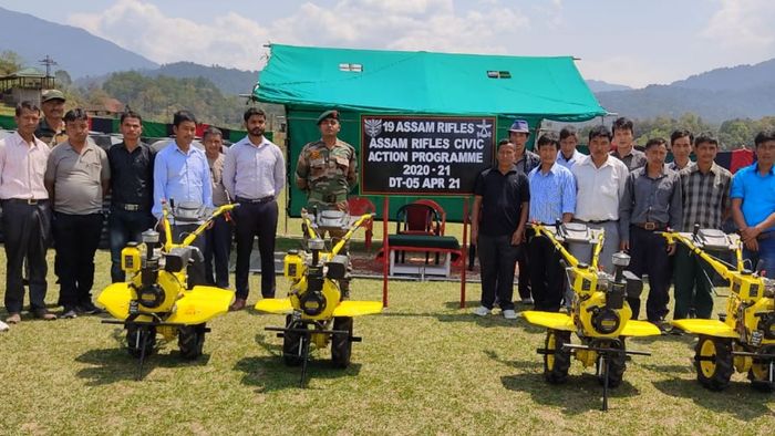 AR distributes hand held tractors and PVC water tanks among villagers