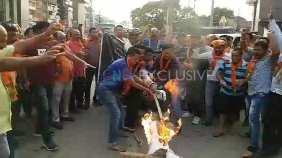 Protest in Assam against Mamata Banerjee after attack on Himanta's convoy Protest in Assam against Mamata Banerjee after attack on Himanta's convoy
