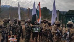 Indo-Pak troops exchange sweets along LoC in J&K's Poonch on New Year Indo-Pak troops exchange sweets along LoC in J&K's Poonch on New Year