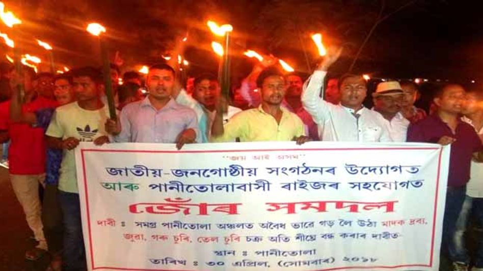 ASSAM: TORCH-LIT PROTEST IN TINSUKIA DISTRICT ASSAM: TORCH-LIT PROTEST IN TINSUKIA DISTRICT