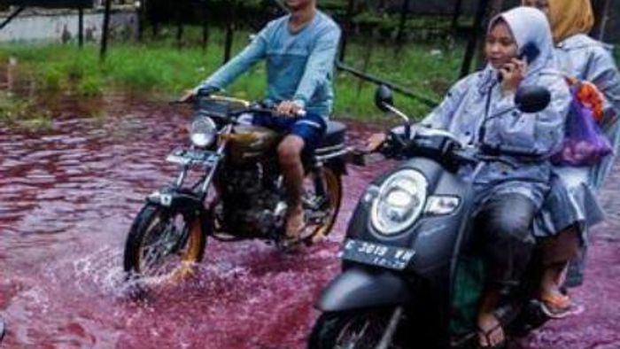 Blood-red flood in Indonesia’s village