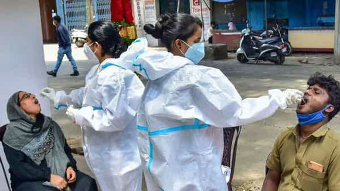 India logs 70,421 new COVID-19 cases, lowest since April 1