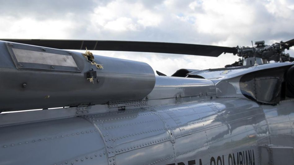 Helicopter carrying Colombia's President Duque struck by bullets in attack Helicopter carrying Colombia's President Duque struck by bullets in attack