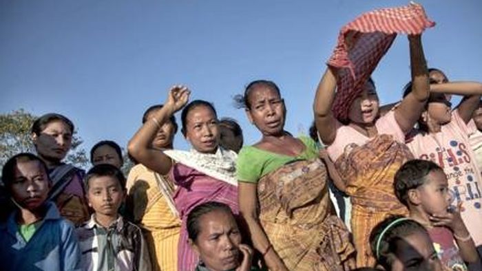 riot-displaced Santhals, Bodos and Muslims