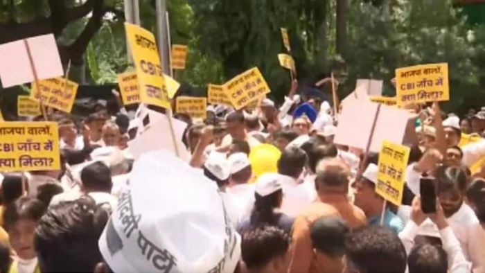 AAP supporters protest outside BJP headquarters in Delhi over CBI raids