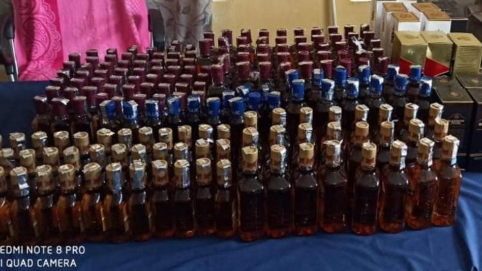 Meghalaya police seize 342 bottles of alcohol from Tata Nano Meghalaya police seize 342 bottles of alcohol from Tata Nano