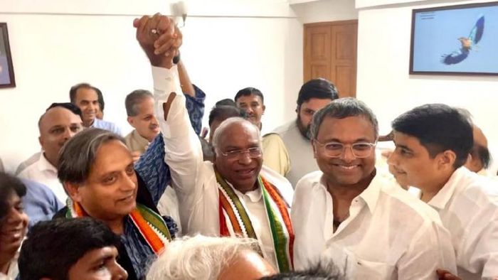 New Congress president Mallikarjun Kharge with Congress leader Shashi Tharoor after the election results were announced