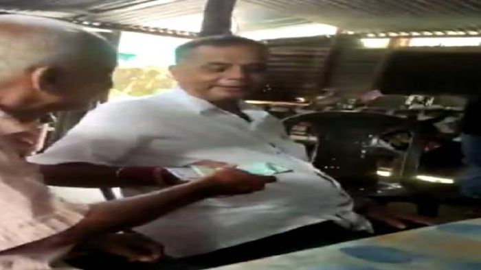 Screen grab of Assam government official Dimbeswar Rai while accepting bribe in Bongaigaon