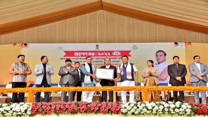 Himanta Biswa Sarma distributing incentive to schools