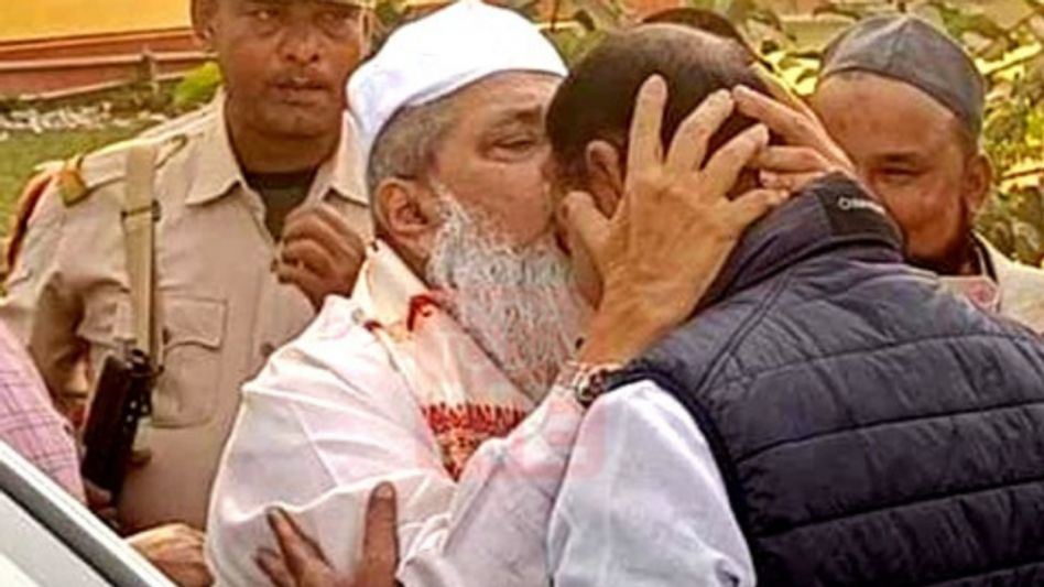 Assam Congress Zilla Parishad member expelled after AIUDF chief Badaruddin Ajmal kissed him Assam Congress Zilla Parishad member expelled after AIUDF chief Badaruddin Ajmal kissed him