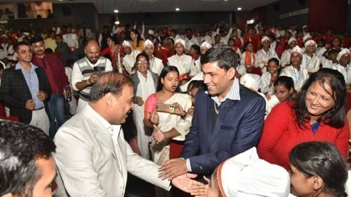 Assam Chief Minister Himanta Biswa Sarma while interacting with the children of the sanitation workers